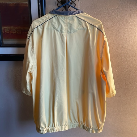 Nike Golf pullover. Yellow w/slate blue trim. It has front pockets that zip. - Picture 4 of 7